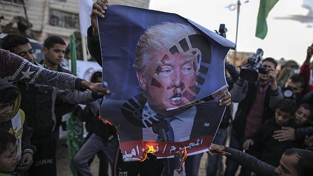 Trump's picture being burned in Lebanon (Photo: EPA)