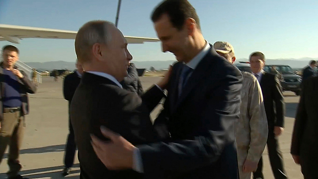 Vladimir Putin and Bashar Assad meeting at the Russian air base in Syria in 2017 (Photo: AP, Presidential TV)