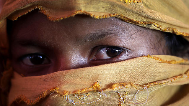 סיפרה שנאנסה בחודש אוגוסט על ידי כוחות הביטחון של מיאנמר. ס', בת 22 ואם לשניים (צילום: AP) (צילום: AP)
