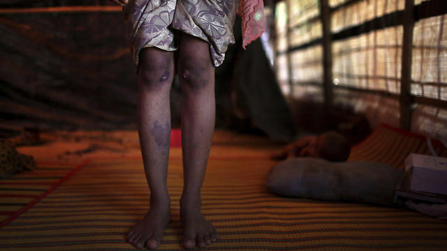 נגררה מחוץ לביתה, הוכתה קשות ועברה אונס קבוצתי. ר', בת 13 (צילום: AP) (צילום: AP)