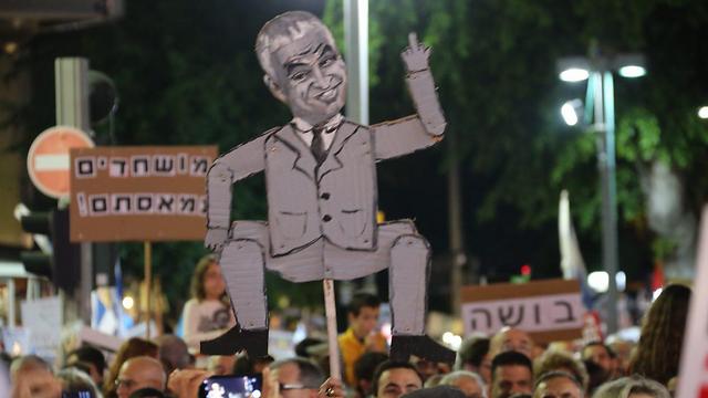 Finance Minister Kahlon presented as a puppet (Photo: Motti Kimchi)