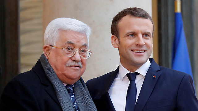 Abbas with French President Macron (Photo: Reuters)