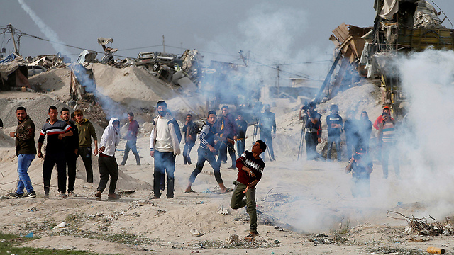 alestinian protestors clash with IDF forces near the Gaza border fence  (Photo: Reuters)