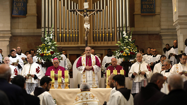 Pizzaballa (C) gives sermon at the Church of the Nativity (Photo: EPA)