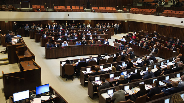 Israeli lawmakers at work (Photo: Yoav Dudkevitch)