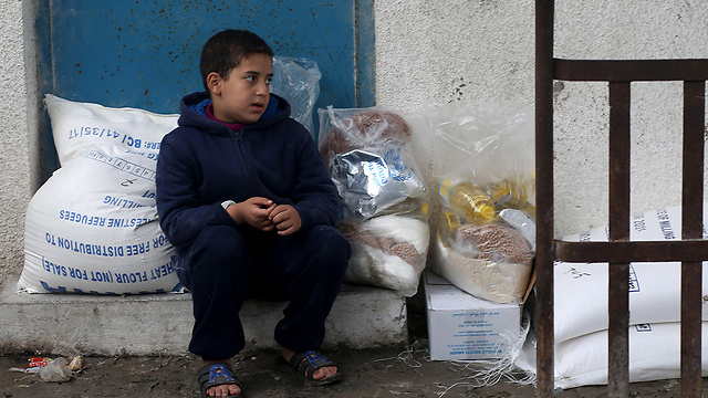 UNRWA food distribution center in Gaza (Photo: AFP)