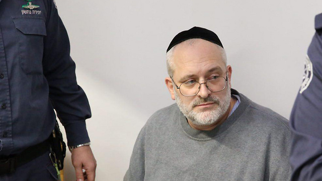 Elitzur upon his extradition back to Israel from Brazil (Photo: Motti Kimchi)