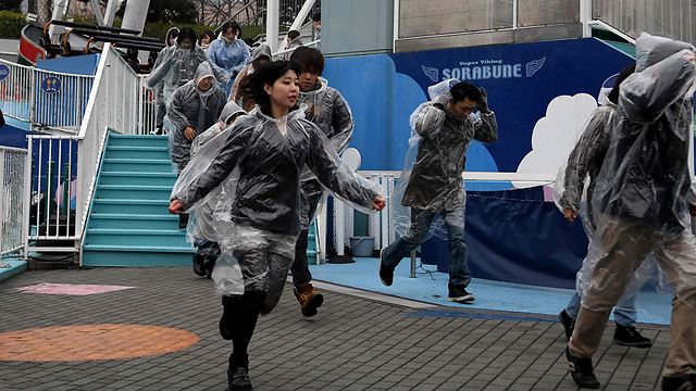תרגיל הפינוי בטוקיו (צילום: AFP) (צילום: AFP)
