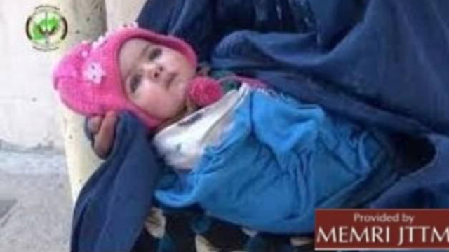 תמונה שהפיץ מכון ממר"י ושבתקשורת העולמית דווח כי נראית בה התינוקת שנוצלה לניסיון הפיגוע ()
