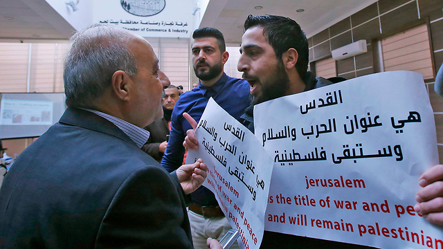 Protesters disrupting seminar in Bethlehem (Photo: AFP)