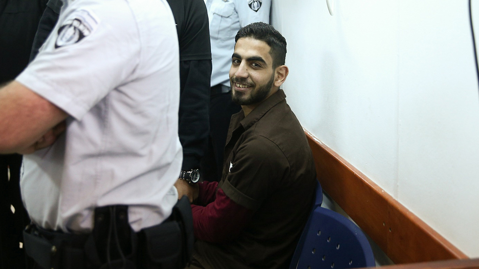 Террорист в суде. Фото: Охад Цвайгенберг