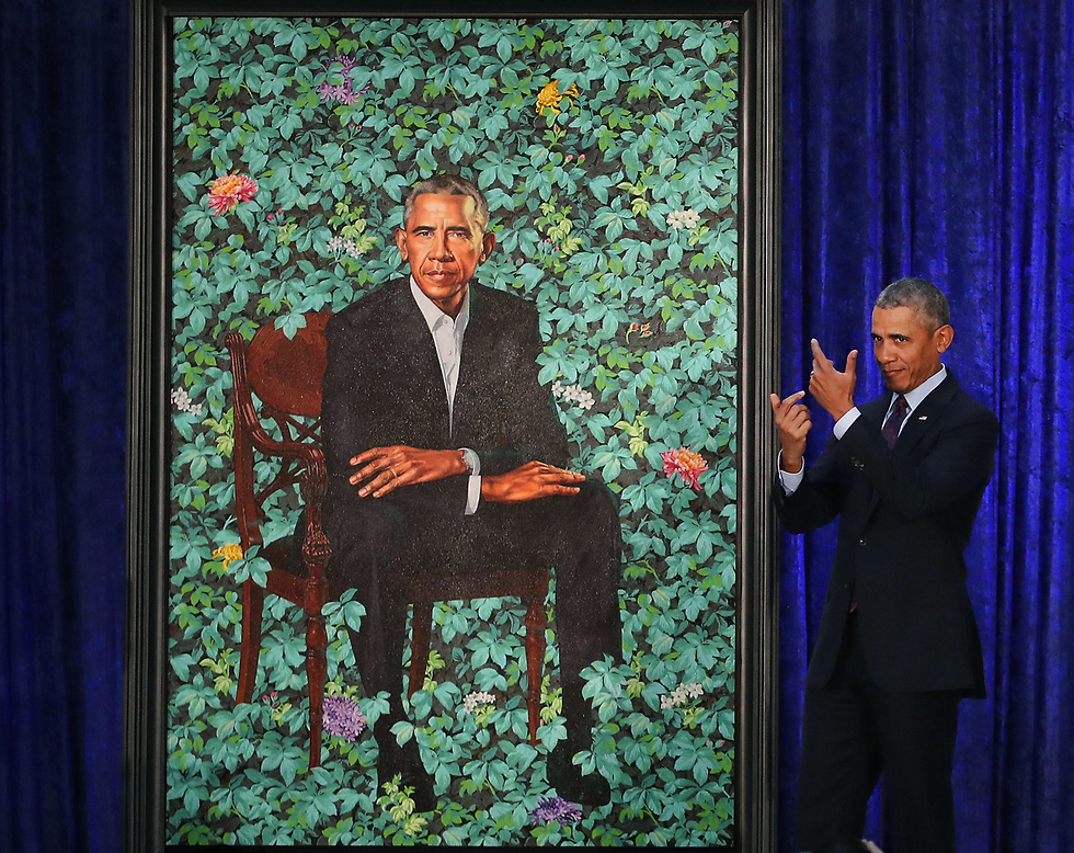 ברק אובמה בטקס חשיפת הדיוקן הרשמי שלו בוושינגטון (צילום: AFP) (צילום: AFP)