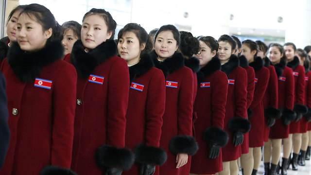 "שפחות מין של המשטר". בדרך הביתה לדרום קוריאה (צילום: AFP) (צילום: AFP)