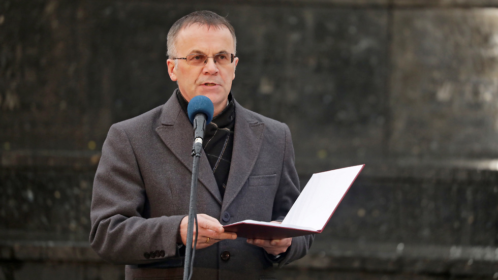 Poland's Deputy Minister of Culture and National Heritage Jaroslaw Sellin speaking at an event to mark the International Holocaust Remembrance Day in Warsaw.