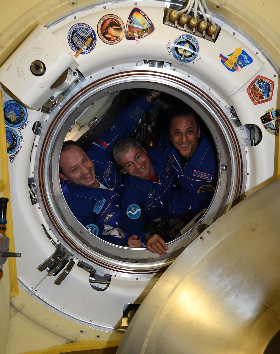 נפרדים מהאסטרונאוטים והקוסמונאוט שחזרו השבוע לכדור הארץ (צילום: סקוט טינגל, נאס"א) (צילום: סקוט טינגל, נאס