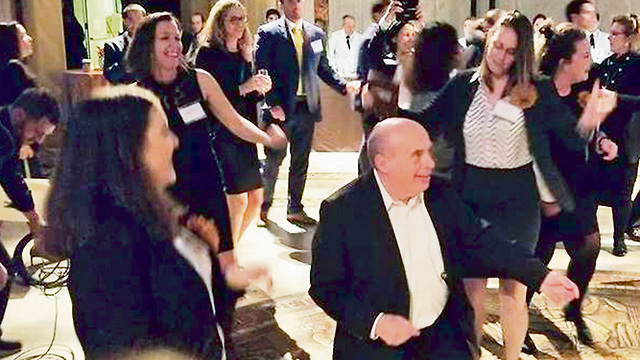 Sharansky and the Jewish Agency envoys dancing to Israeli tunes (Photo: Jewish Agency's Twitter account)