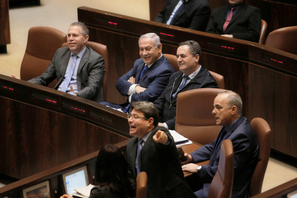 Netanyahu with Likud ministers, some of whom are eyeing his seat (Photo: AP)