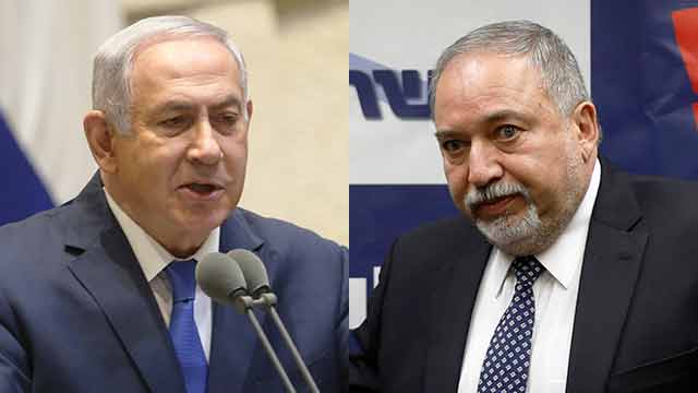PM Netanyahu (L) and Defense Minister Lieberman were not doing enough, Goldin's parents said (Photo: Reuters, Alex Kolomoisky)