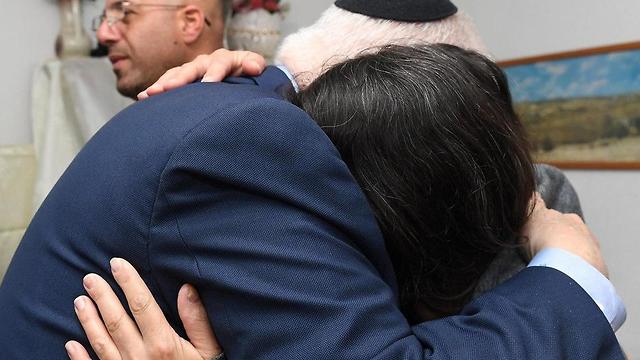 President Rivlin (L) embracing Ziv Daus's mother (Photo: Mark Neiman/GPO)