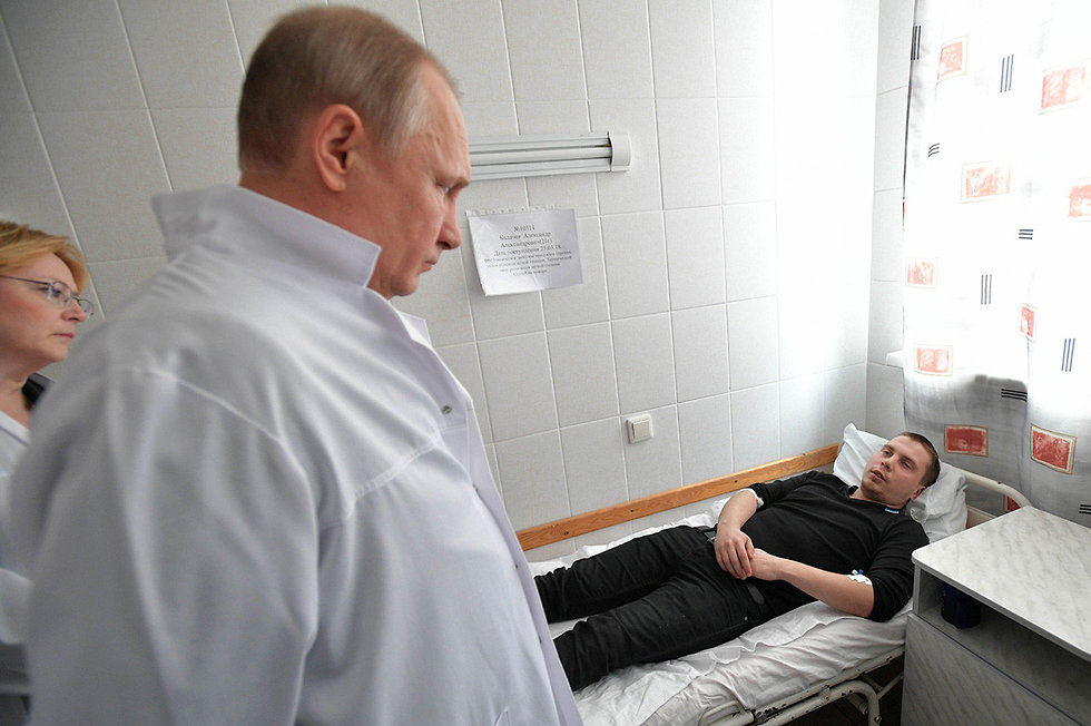 Путин в больнице Кемерово. Фото: AFP