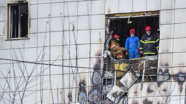Здесь бушевал пожар, но двери были закрыты. Фото: AFP
