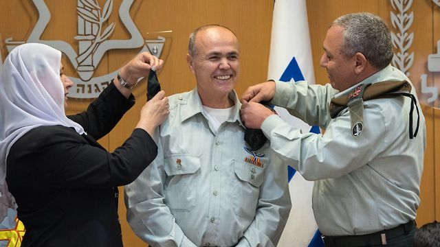 Brig. Gen. Kamil Abu Rokon receiving his new rank (Photo: IDF Spokesperson's Unit)