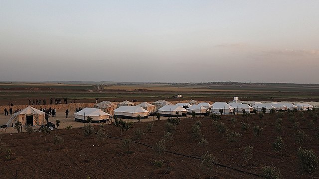 Tent encampments set up by the border (Photo: EPA)