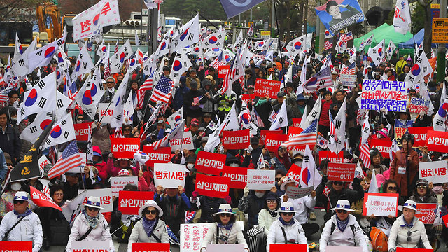 פאק גון הייה נשיאת דרום קוריאה לשעבר נשלחה ל 24 שנות מאסר (צילום: AFP)