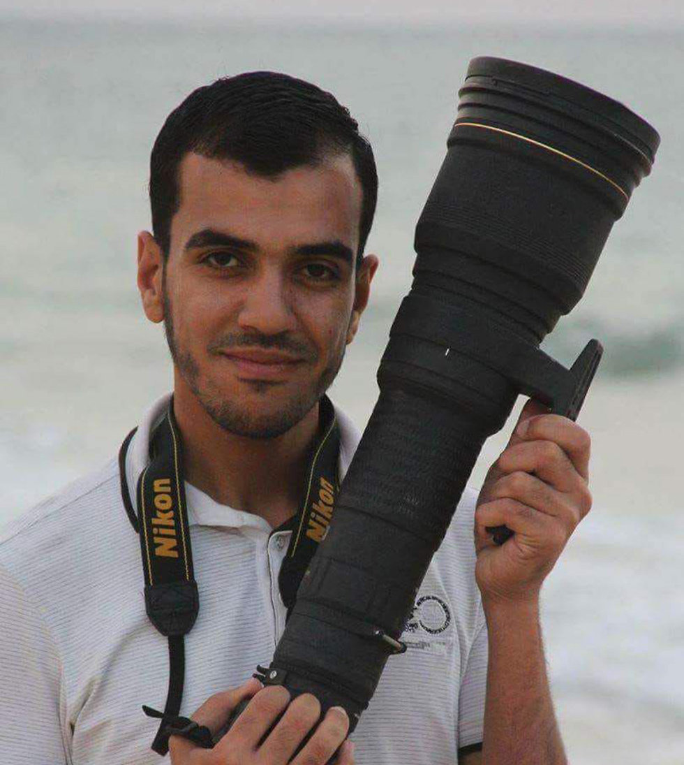 יאסר מורתג'א עיתונאי צלם נהרג בעימותים בעזה ()