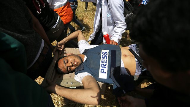 Murtaja moments after being shot (Photo: Reuters)