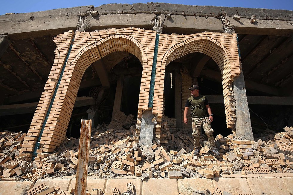 קבר סדאם חוסיין כפר אל-אווג'ה עיראק (צילום: AFP)
