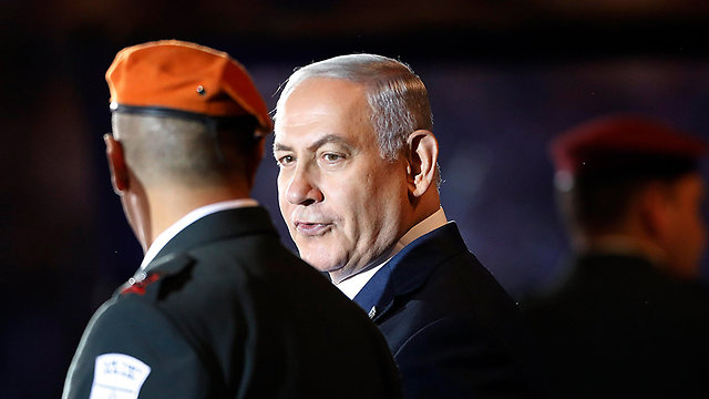Netanyahu wishes to use the migrant problem to impose elections on his coalition partners before being indicted (Photo: Alex Kolomoisky)