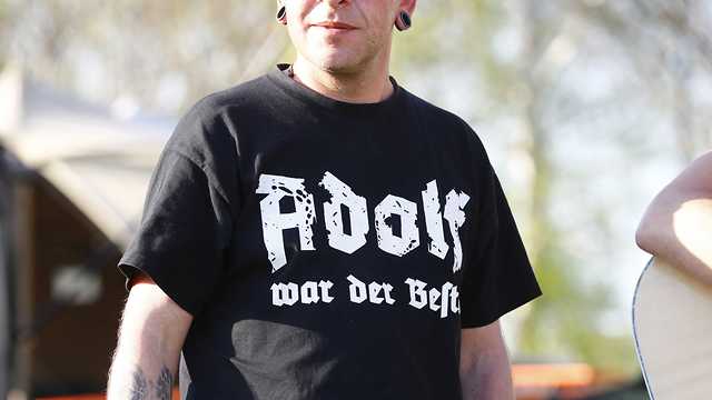 T-shirt saying 'Adolf is the best' at a far-right rock festival (Photo: Reuters)