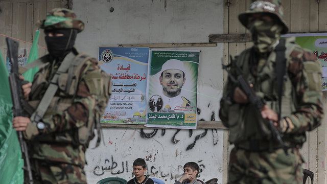 Hamas militants at Albatsh's funeral (Photo: EPA)