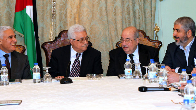 A past meeting between Hamas and Fatah chiefs. The Palestinian National Council has not convened since 2009 (Photo: EPA)