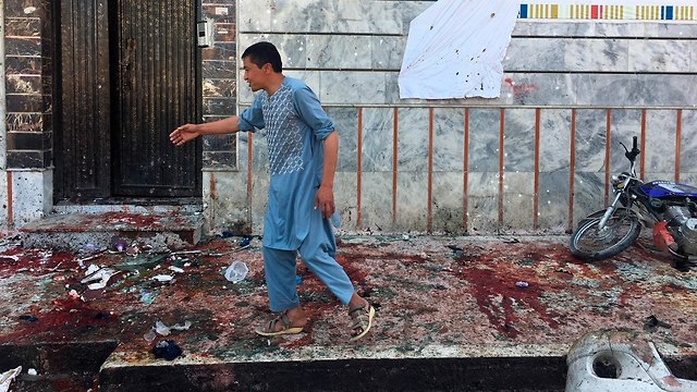 פיגוע התאבדות באפגניסטן קאבול 57 נרצחים (צילום: AP)