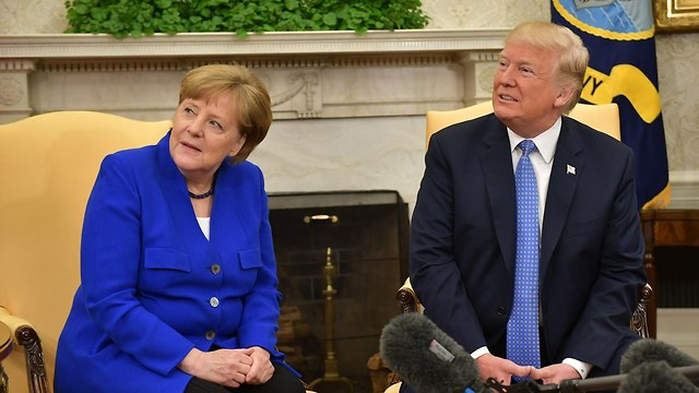 German Chancellor Merkel (L) and US President Trump (Photo: AFP)