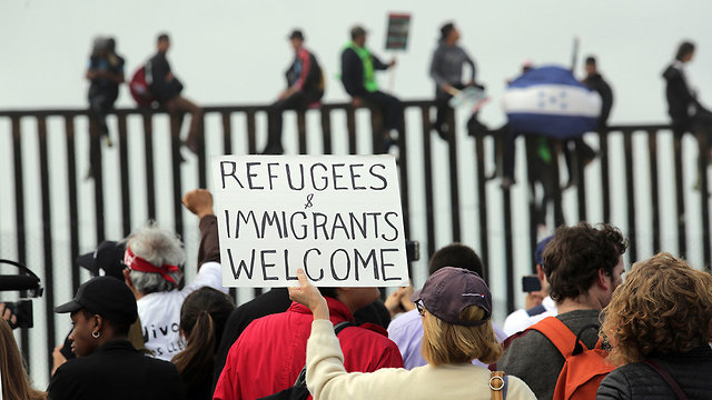 Американские левые приветствуют мигрантов. Фото: AFP