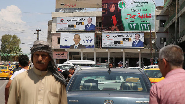 כרזות לבחירות בעיראק (צילום: AFP)