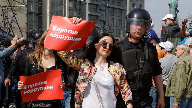 הפגנה במוסקבה נגד פוטין (צילום: רויטרס)