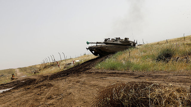 Israeli tank in Golan Heights (Photo: Reuters)