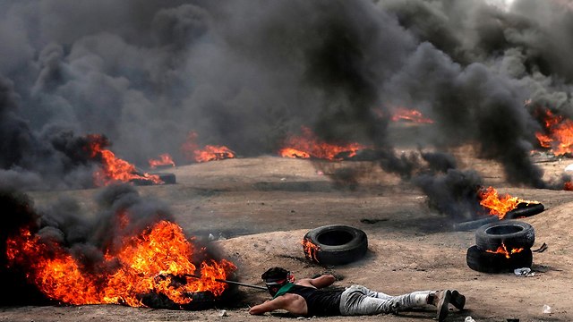 התפרעויות פלסטינים גבול רצועת עזה (צילום: AFP)