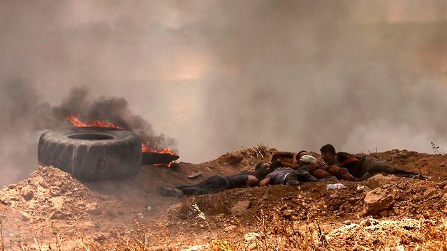 התפרעויות פלסטינים גבול רצועת עזה (צילום: AFP)