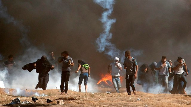 התפרעויות פלסטינים גבול רצועת עזה (צילום: AFP)