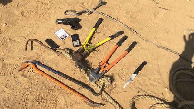 Some of the weapons and tools seized from the slain militants (Photo: IDF Spokesperson's Unit)