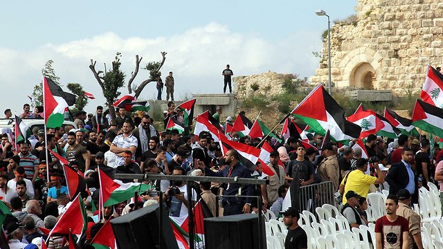 יום הנכבה מפגינים פרו פלסטינים נגד ישראל ב לבנון (צילום: AFP)