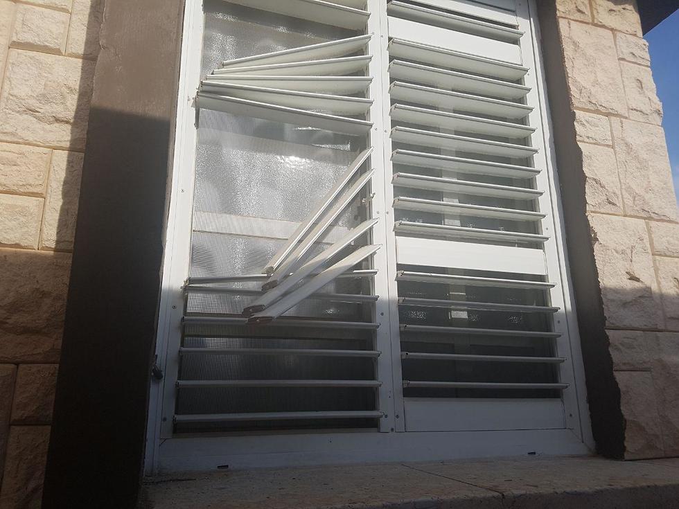 Window damaged by machinegun fire