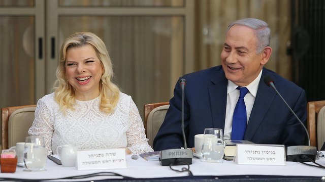 Prime Minister Netanyahu with wife Sara (Photo: Alex Kolomoisky)