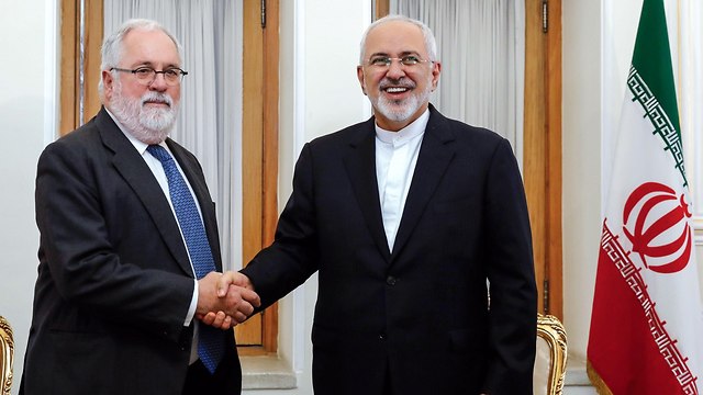 Miguel Arias Canete, Mohammad Javad Zarif in Teheran  (Photo:AFP)