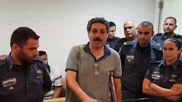 Mossawa Center Director Jafar Farah in court Saturday. The human rights activist said a cop broke his leg on purpose (Photo: Ahiya Raved)
